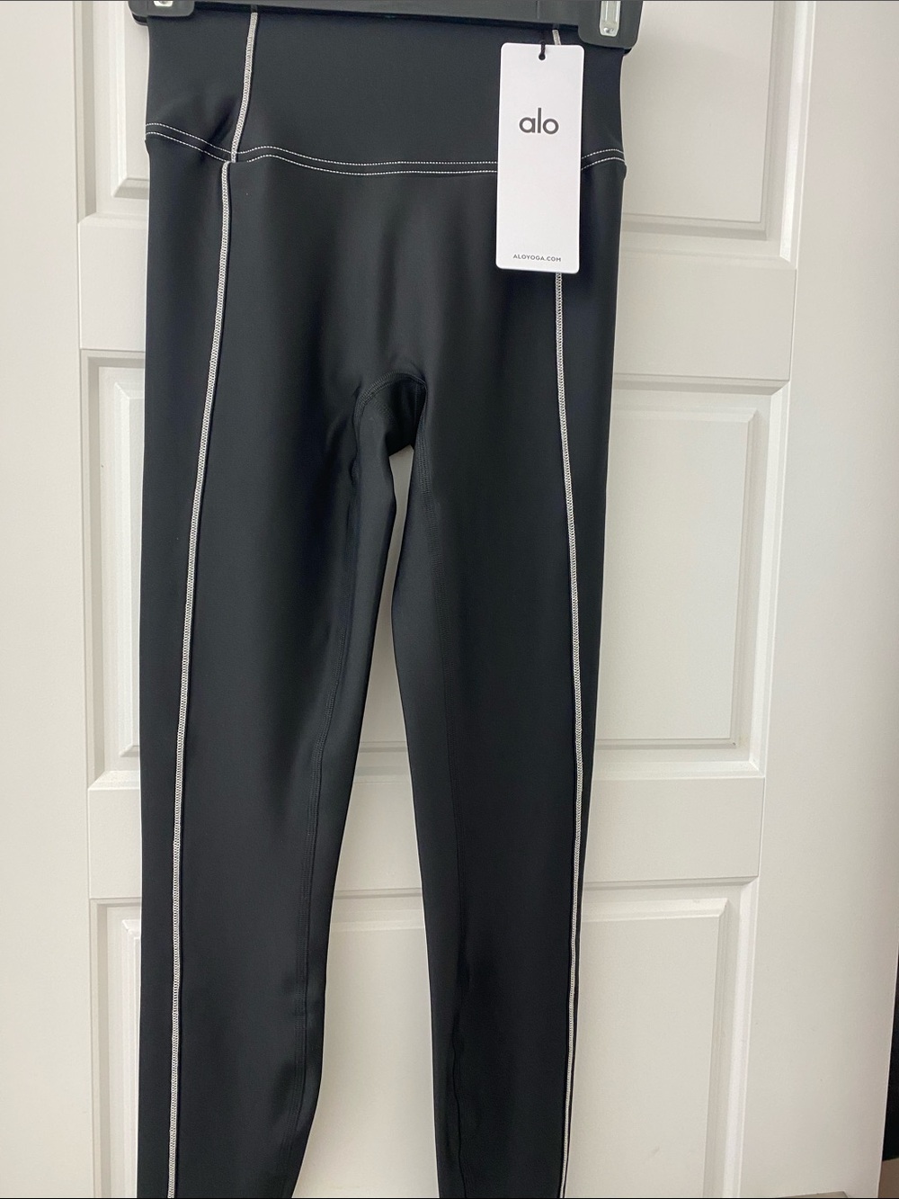 ALO Yoga high waist leggings 

Size XS.  Color black and white